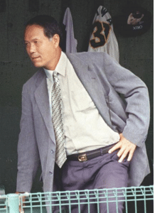 Miwata watching the action from the dugout. Miwata was named "formation manager," or head of scouting, for Orix in 1997, a year before his suicide.