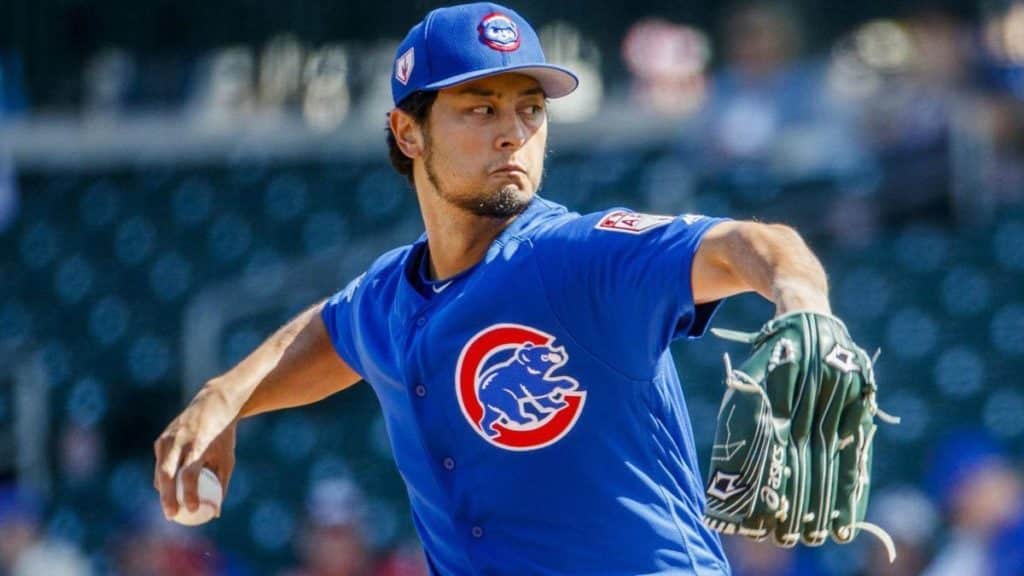 Japan's starting pitcher Yu Darvish and catcher Kenji Johjima cheer News  Photo - Getty Images