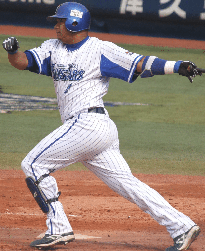 José López swings at a pitch during a 2015 game with the BayStars. On October 31, López became just the third player to get 1000 hits in both MLB and NPB, and the first non-Japanese player to do so. Photo taken from Wikimedia Commons