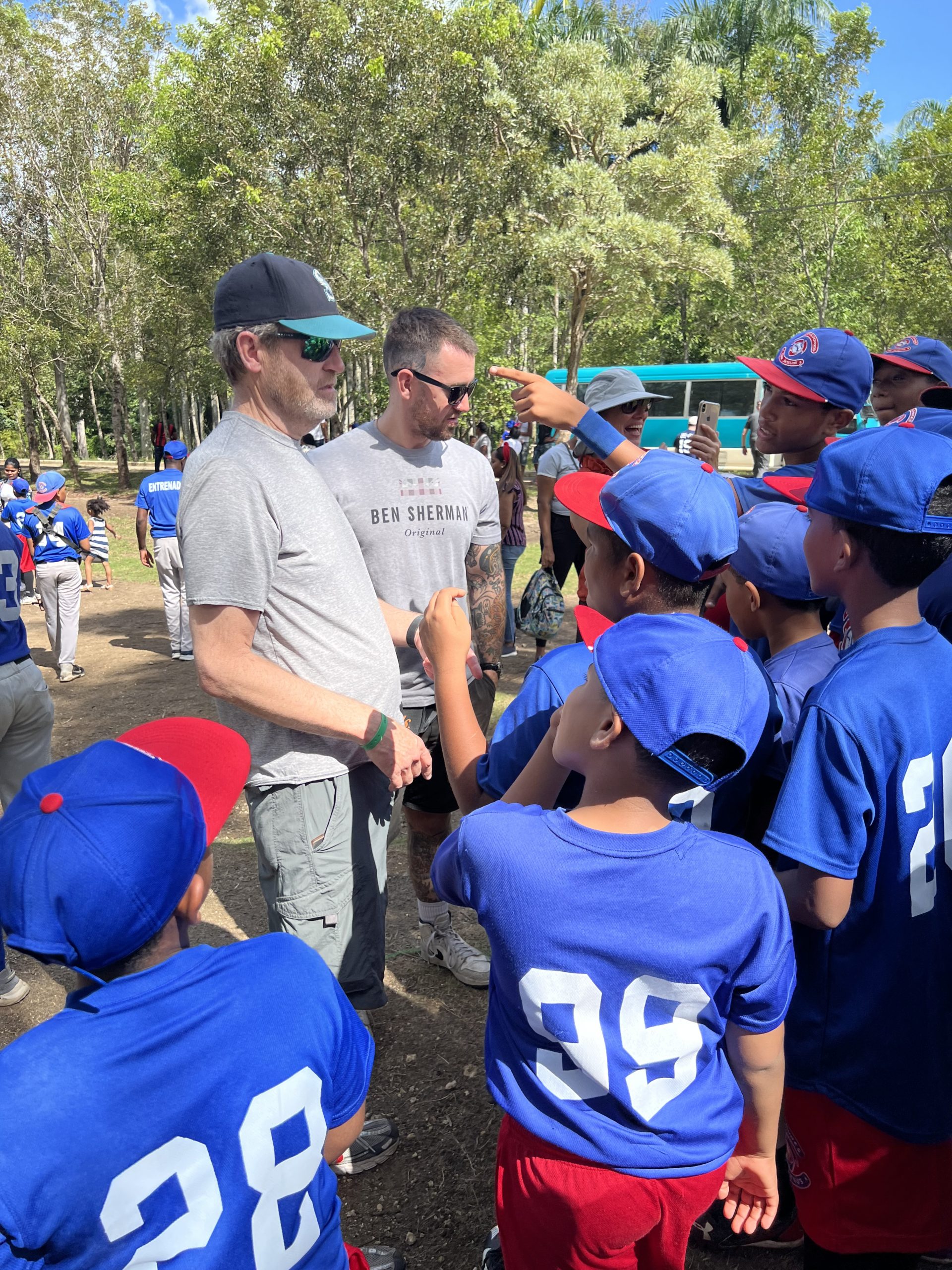 Matt and Rob make new friends at the Triunfadores de Jesus baseball program in Pantoja, Santo Domingo.